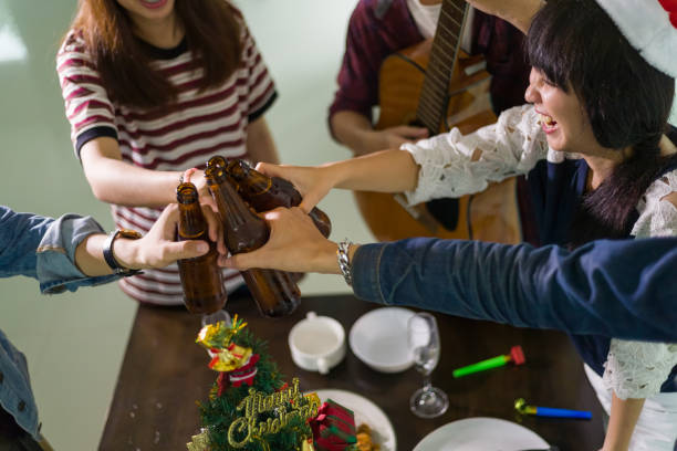 Picture groupof young asians celebrate the christmas and happy new year party. stock photo