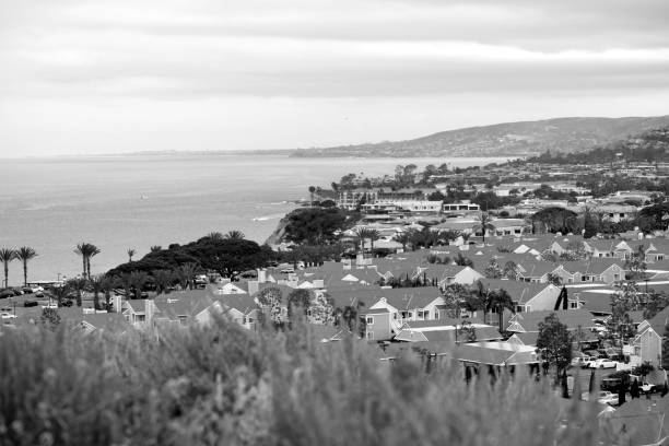 A black & white snapshot of Dana Point with the rest of Orange County visible along the coastline.
