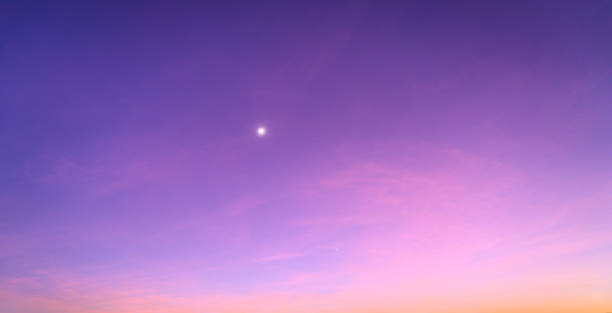 istock Beautiful twilight sky with moon at dusk after sunset or before sunrise 1220492264