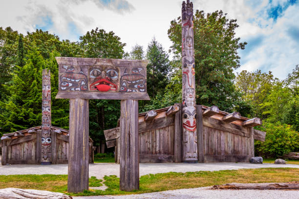 Vancouver, British Columbia, Canada - July 6, 2018: First Nations totem poles and Haida houses in Museum of Anthropogy at UBC