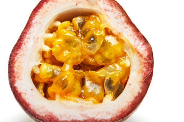 istock Passiflora half fruit app close up isolated on a white background 1220498512