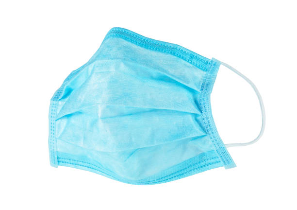 istock Blue doctor mask isolated on a white background. Corona virus protection. 1220499521