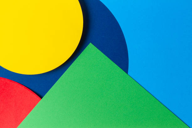 istock Abstract colored paper texture background. Minimal geometric shapes and lines in light blue, navy, red, green and yellow colors 1220500111