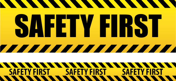 Banner safety first. Seamless tape, danger. Banner safety first. Seamless tape, danger. Yellow police line. Danger warning. safety first, tape isolated on white background. safety first at work stock illustrations