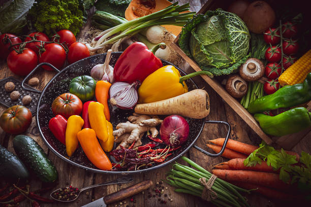 istock Healthy fresh organic vegetables on rustic wooden table 1220501466