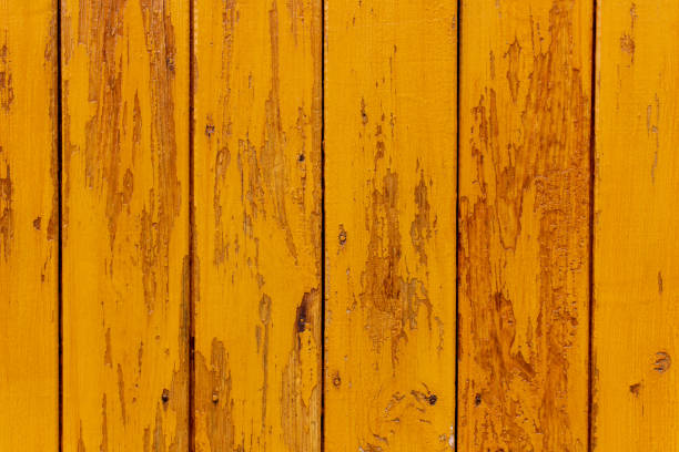 istock Yellow wooden wall made of boards with structure 1220501694