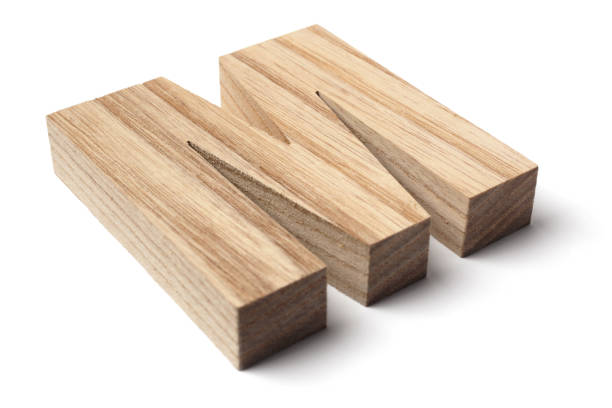 istock Tilted Wooden Letter M on White Background 1220513181