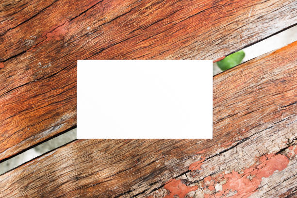 istock Blank white postcard placed on the old wood plank 1220513287