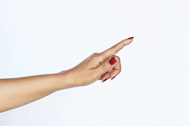 Pointing woman hand. photo stock photo