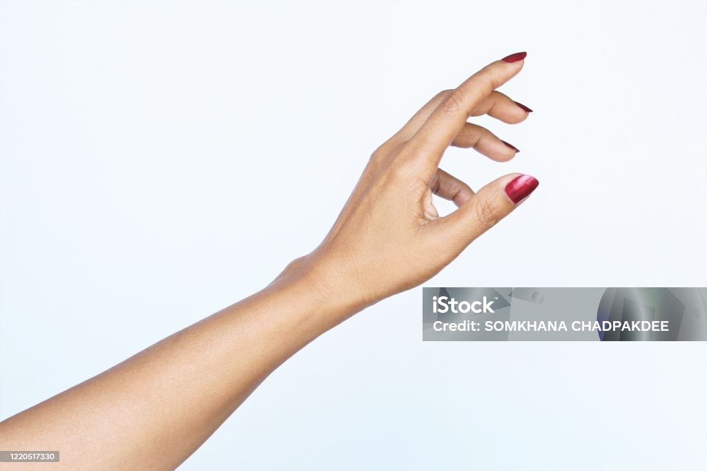 Gesture reaching up woman hand. photo Gesture reaching up woman hand red nail polish. photo isolate on white copy space Hand Stock Photo