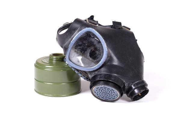 istock Vintage gasmask isolated on a white background - Green filter 1220517391