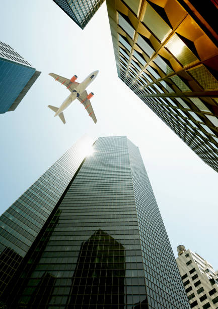 istock Airplane flying over skyscrapers, Lower Manhattan, NYC. 1220520549