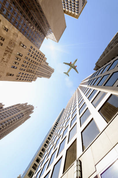 istock Airplane flying over skyscrapers, Downtown Chicago. 1220521143