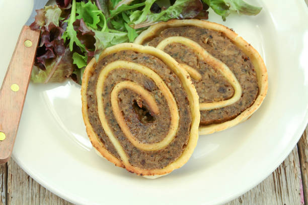slices of fleischschnacka and salad on a plate
