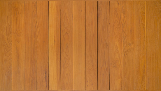 Natural wood slats wall or lath line arrange patter. Flooring pattern surface texture. Close-up of interior architecture material for design decoration background.