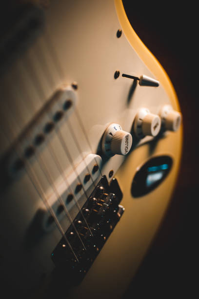 istock lectric guitar closeup detail 1220528948