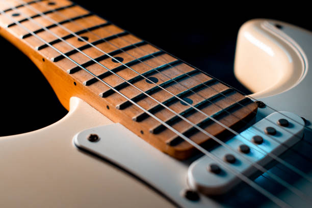 istock lectric guitar closeup detail 1220529032