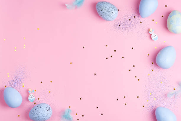 istock Beautiful Easter pastel blue eggs on pink stars background with copy space 1220529681