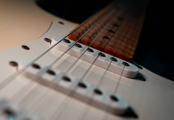 istock lectric guitar closeup detail 1220530048