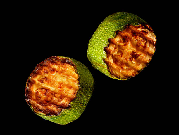 Two slices of zucchini grill rotated