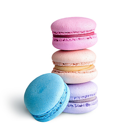 Three macaroon each other and one next on white background