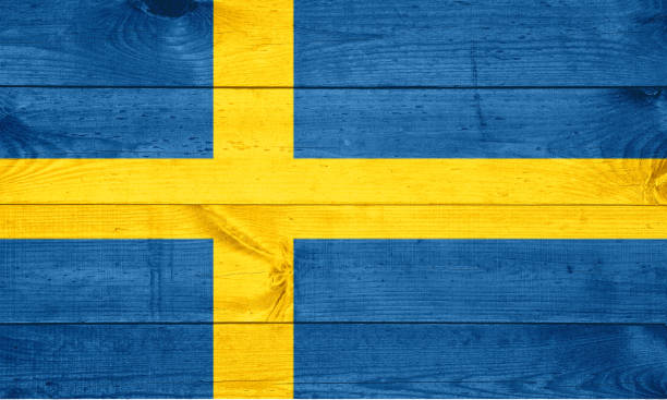 istock sweden flag painted on old wood background 1220538706