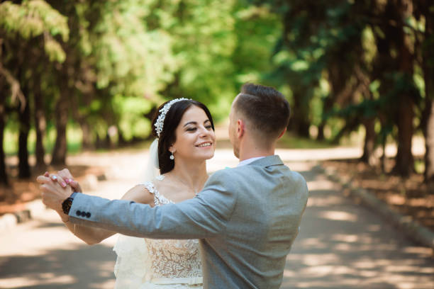 istock Happy bride and groom on their wedding 1220539692