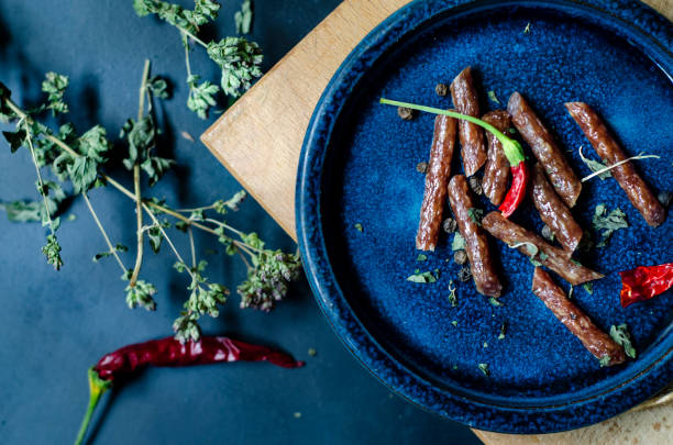 istock spicy tyrolini stick salami 1220539927