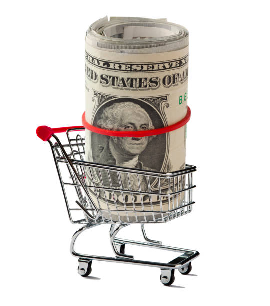 米国の紙をロールアップしたショッピングカート - three dimensional shape paper currency wealth shopping cart ストックフォトと画像