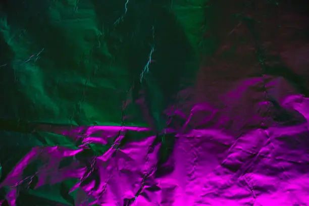 Photo of dark holographic foil abstract texture