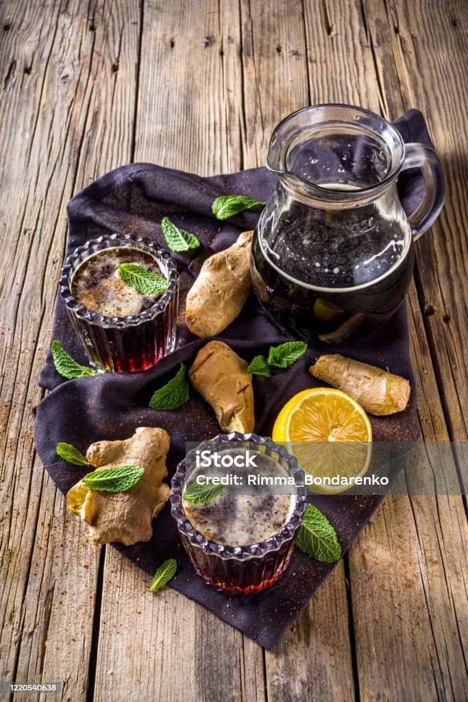 Indian Panakam drink Indian summer refreshment beverage, Panakam Or Gur (Jaggery) Sharbat, Panakaam drink, Traditional sarbats, infusions of fruits, flowers, herbs, roots, rustic wooden background copy space Black Peppercorn Stock Photo