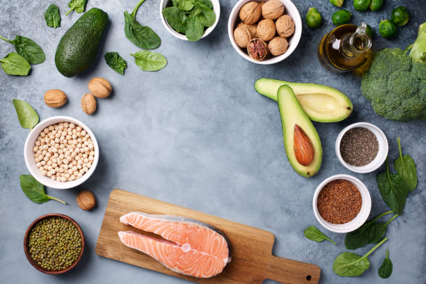 istock Products containing omega 3. Fish salmon, walnuts, spinach, flaxseeds, chia seeds, Brussels sprouts, olive oil, avocados, broccoli 1220541447