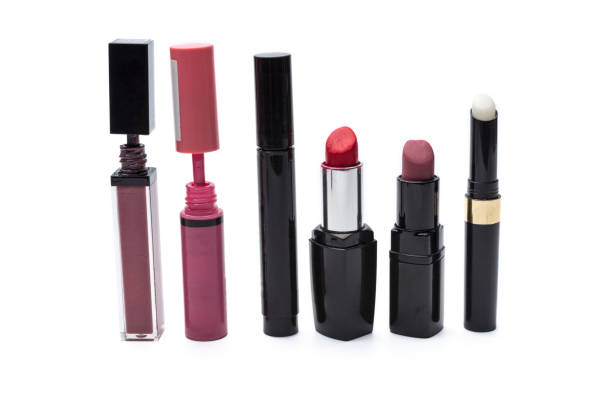 istock Lipstick, nail Polish and mascara on white background. 1220541614