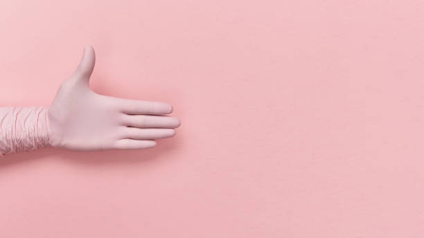 istock Disposable gloves in pink on the palm 1220542286