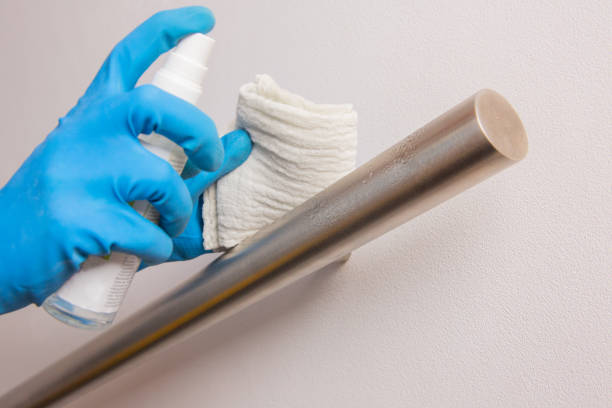 istock Hand clean and disinfect steel railing, corona virus spreading prevention 1220543030