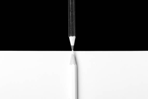 istock white and black pencil on white and black background 1220543172