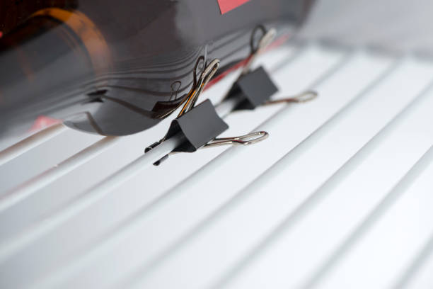 Lifehacks - Binder clips keep your bottles perfectly stacked in the freezer.