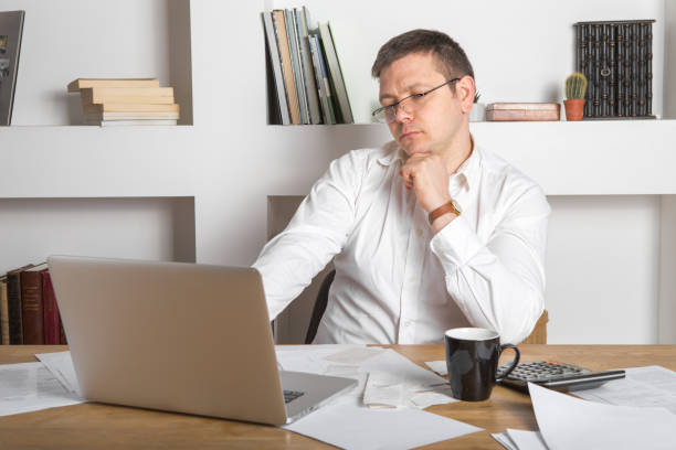 istock Businessman working on Desk at home office business 1220545437