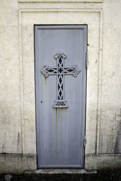 istock Door in cemetery tomb 1220545834