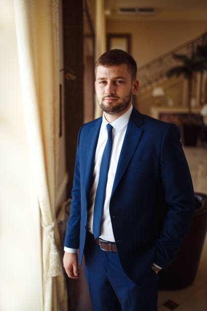 istock Elegant groom in suit. Businessman. 1220547308