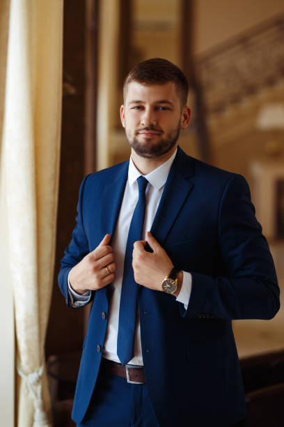 istock Elegant groom in suit. Businessman. 1220547436