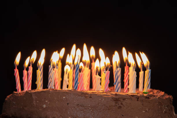 istock Chocolate Birthday Cake with Candles 1220547533