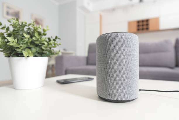 istock Smart speaker device in living room. Smart home. 1220549146