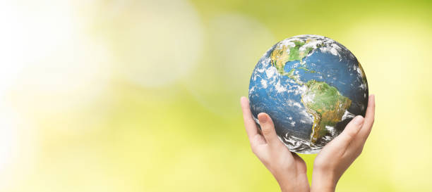 istock Earth globe in family hands. World environment day 1220549161