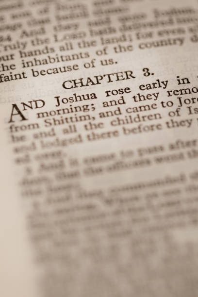 istock Close up abstract macro image of a pages from the bible. 1220549224