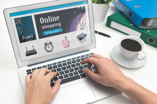 istock Man is shopping online on laptop 1220549936