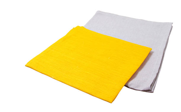 istock yellow paper napkin isolated on white background 1220549944