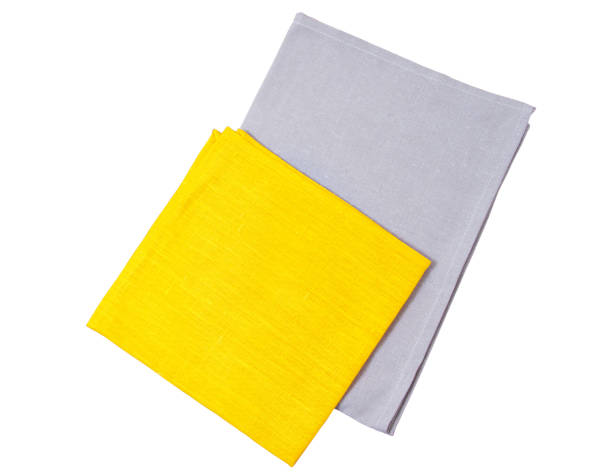 istock Yellow and gray paper napkin top view isolated copy space 1220549946