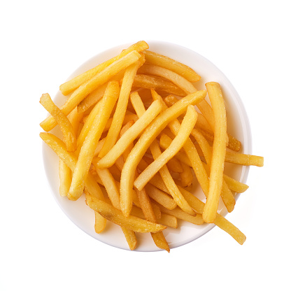 French fries in a plate isolated on white background, top view.
