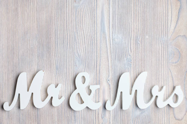 istock White letters mr and vhk on a wooden background. Top view. Copy space. 1220550727